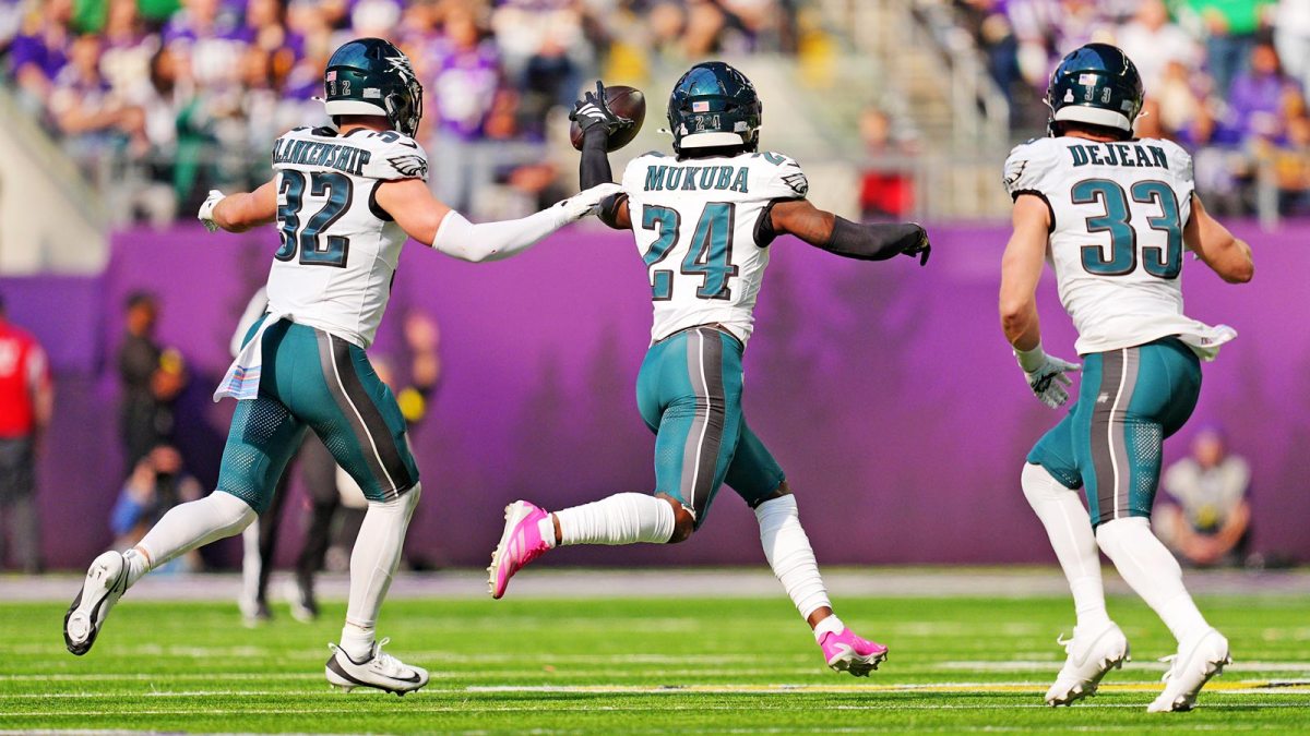 Philadelphia Eagles safety Andrew Mukuba (24) celebrates after making an interception during the second half against the Minnesota Vikings at U.S. Bank Stadium.
