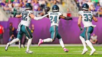 Philadelphia Eagles safety Andrew Mukuba (24) celebrates after making an interception during the second half against the Minnesota Vikings at U.S. Bank Stadium.