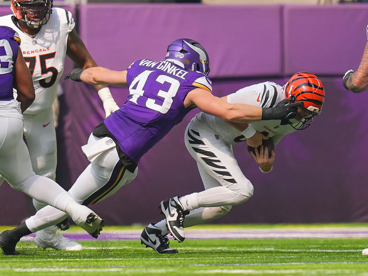Cincinnati Bengals quarterback Jake Browning (6) is sacked by Minnesota Vikings outside linebacker Andrew van Ginkel (43) during the first half at U.S. Bank Stadium.