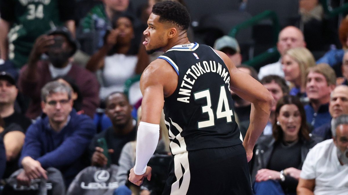Milwaukee Bucks forward Giannis Antetokounmpo (34) reacts after scoring against the Dallas Mavericks during the fourth quarter at American Airlines Center.