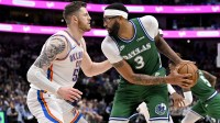 Dallas Mavericks forward Anthony Davis (3) looks to move the ball past Oklahoma City Thunder center Isaiah Hartenstein (55) during the second half at the American Airlines Center.