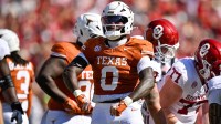 Texas Longhorns linebacker Anthony Hill Jr. (0) celebrates during the game between the Texas Longhorns and the Oklahoma Sooners at the Cotton Bowl.