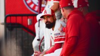 Los Angeles Angels infielder Anthony Rendon (6) watches game action against the Seattle Mariners during the eighth inning at Angel Stadium.