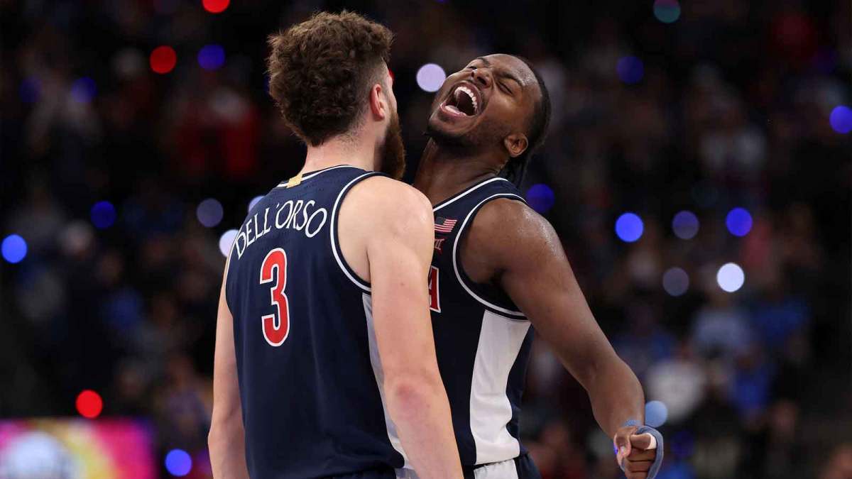 Arizona Wildcats guard Anthony Dell'Orso (3) celebrates with guard Jaden Bradley (0) during the second half of the Hall of Fame Series game against the UCLA Bruins at Intuit Dome.