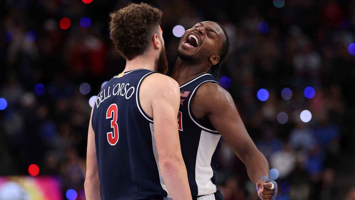 Arizona Wildcats guard Anthony Dell'Orso (3) celebrates with guard Jaden Bradley (0) during the second half of the Hall of Fame Series game against the UCLA Bruins at Intuit Dome.