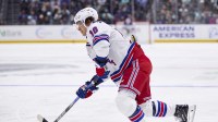 New York Rangers left wing Artemi Panarin (10) looks to take a shot on goal during the second period against the Seattle Kraken at Climate Pledge Arena.