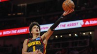 Atlanta Hawks forward Jalen Johnson (1) attempts a shot against the Cleveland Cavaliers during the first quarter at State Farm Arena.