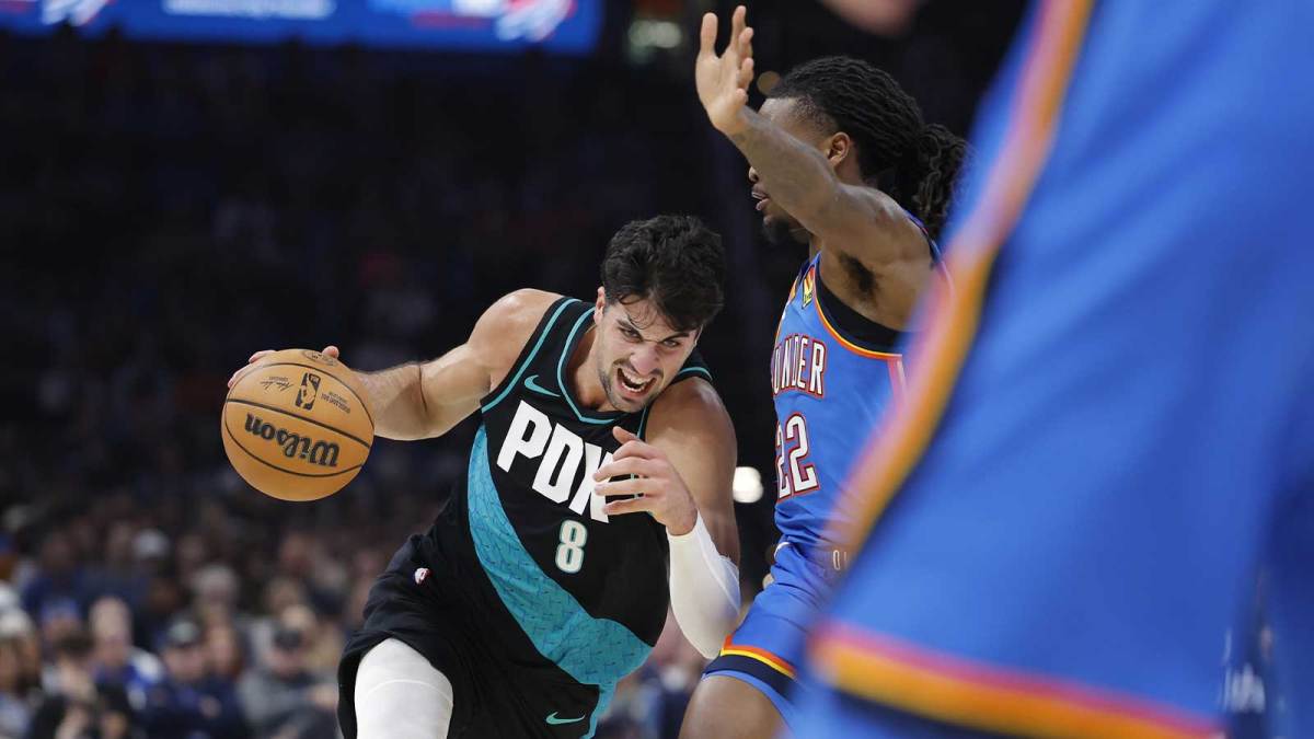 Portland Trail Blazers forward Deni Avdija (8) drives to the basket against Oklahoma City Thunder guard Cason Wallace (22) during the second quarter at Paycom Center.