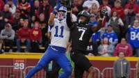 BYU Cougars wide receiver Parker Kingston (11) catches a pass for a touchdown as Iowa State Cyclones defensive back Tre Bell (7) during the fourth quarter at Jack Trice Stadium on Oct. 25, 2025, in Ames, Iowa.