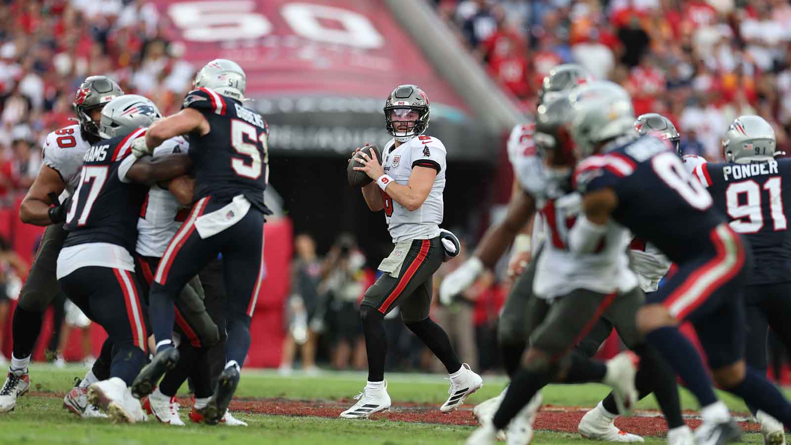 Tampa Bay Buccaneers quarterback Baker Mayfield (6) throws downfield during the fourth quarter against the New England Patriots at Raymond James Stadium.