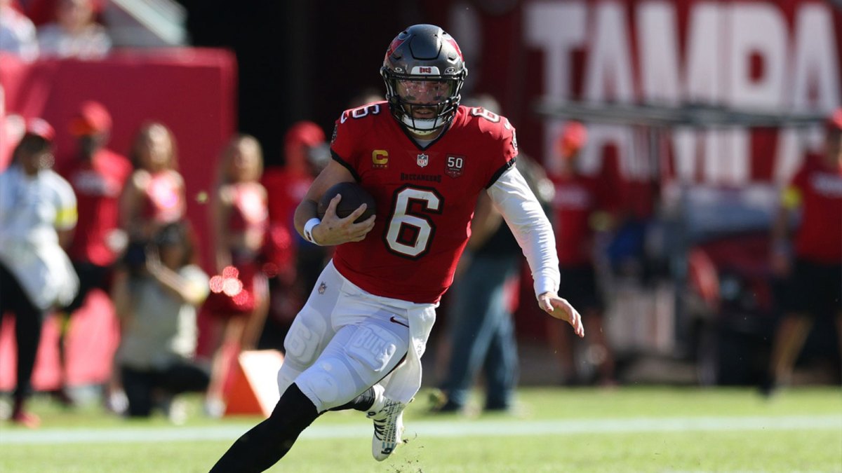 Tampa Bay Buccaneers quarterback Baker Mayfield (6) scrambles during the first half against the Arizona Cardinals at Raymond James Stadium.