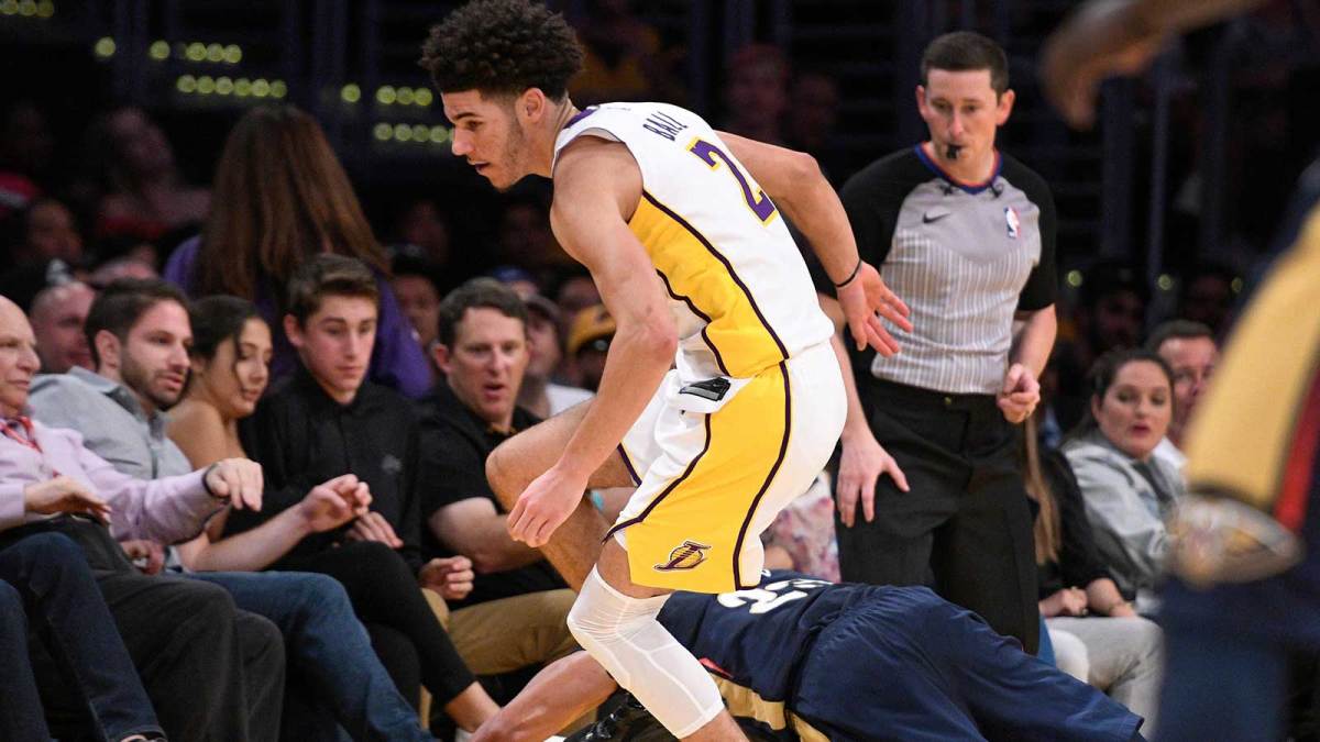 New Orleans Pelicans forward Anthony Davis (23) dives to try to steal the ball away from Los Angeles Lakers guard Lonzo Ball (2) during the fourth quarter at Staples Center. The Pelicans won 119-112.