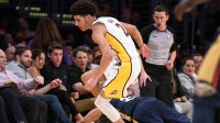 New Orleans Pelicans forward Anthony Davis (23) dives to try to steal the ball away from Los Angeles Lakers guard Lonzo Ball (2) during the fourth quarter at Staples Center. The Pelicans won 119-112.