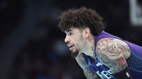 Charlotte Hornets guard LaMelo Ball (1) in a time out during the first half against the New York Knicks at the Spectrum Center.