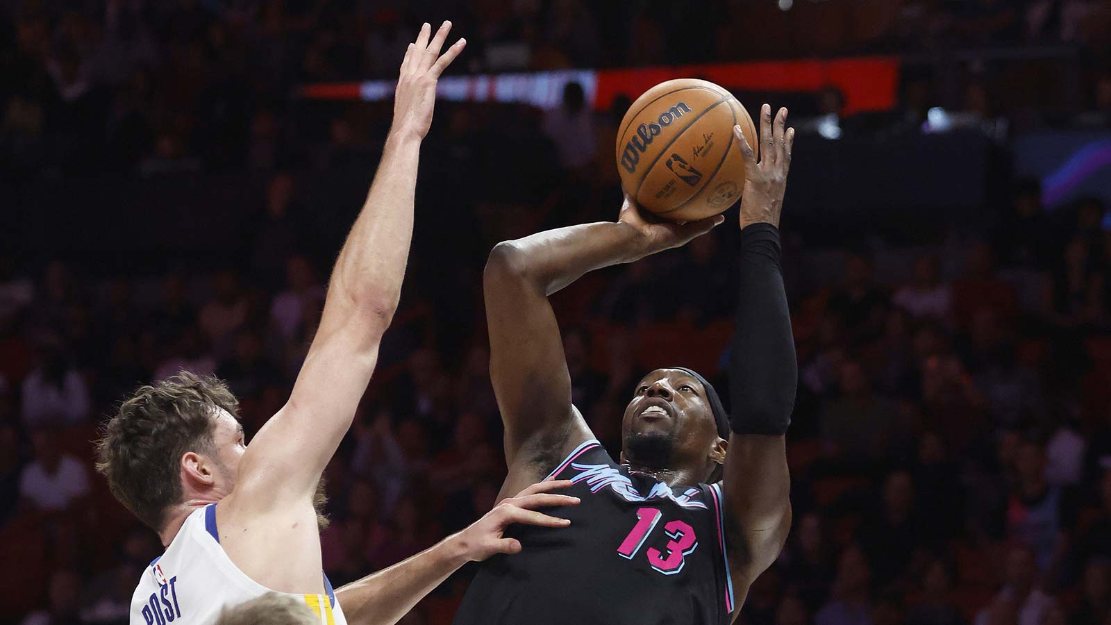 Golden State Warriors center Quinten Post (21) defends against Miami Heat center Bam Adebayo (13) during the second half at Kaseya Center.