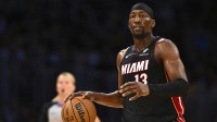Miami Heat center/forward Bam Adebayo (13) moves the ball against the Los Angeles Lakers during the first half at Crypto.com Arena.