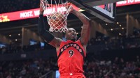 Toronto Raptors forward RJ Barrett (9) dunks for a basket against the Brooklyn Nets in the second half at Scotiabank Arena