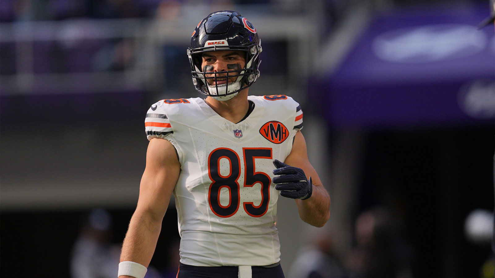 Chicago Bears tight end Cole Kmet (85) warms up before a game against the Minnesota Vikings at U.S. Bank Stadium.