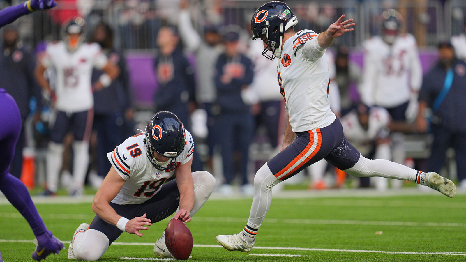 Chicago Bears kicker Cairo Santos (8) kicks a game-winning field goal against the Minnesota Vikings during the fourth quarter at U.S. Bank Stadium.