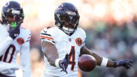 Chicago Bears running back D'Andre Swift (4) celebrates after scoring a touchdown against the Philadelphia Eagles during the first quarter of the game at Lincoln Financial Field.