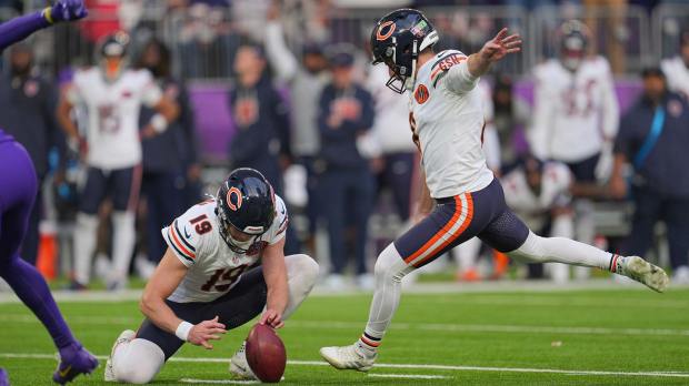 Chicago Bears kicker Cairo Santos (8) kicks a game-winning field goal against the Minnesota Vikings during the fourth quarter at U.S. Bank Stadium.
