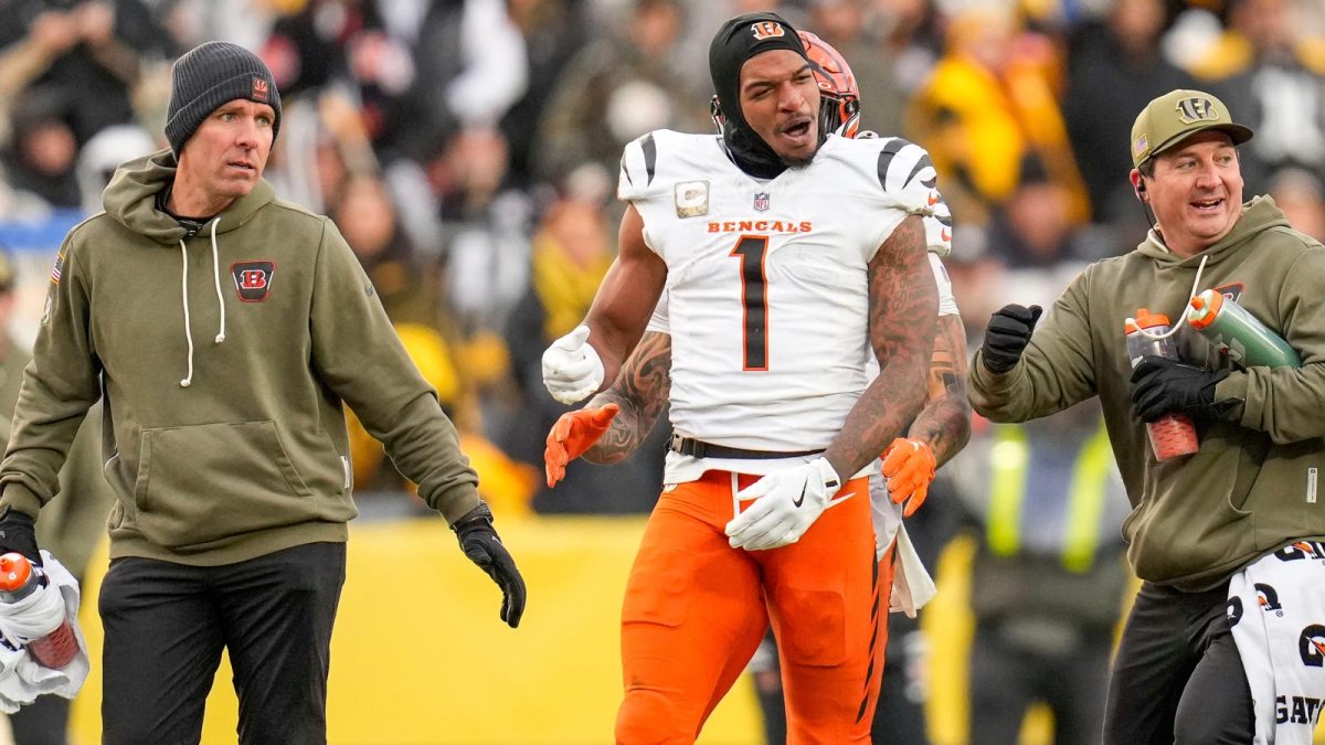 Cincinnati Bengals wide receiver Ja'Marr Chase (1) is pushed out of a skirmish at midfield in the fourth quarter of the NFL Week 11 game between the Pittsburgh Steelers and the Cincinnati Bengals at Acrisure Stadium in Pittsburgh on Sunday, Nov. 16, 2025. The Bengals lost 34-12.