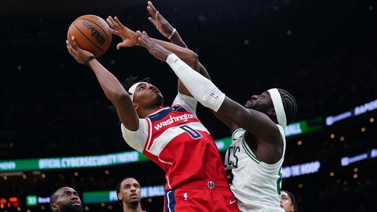 Boston Celtics center Neemias Queta (88) defends against Washington Wizards guard Bilal Coulibaly (0) in the second quarter at TD Garden.