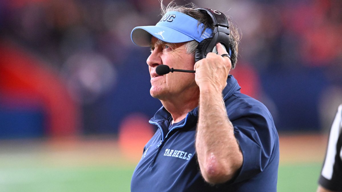 North Carolina Tar Heels head coach Bill Belichick looks to the clock in the fourth quarter game against the Syracuse Orange at the JMA Wireless Dome.