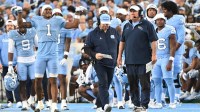 North Carolina Tar Heels head coach Bill Belichick watches play during the first half against the Duke Blue Devils at Kenan Stadium. Mandatory Credit: William Howard-Imagn Images