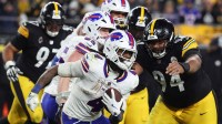 Buffalo Bills running back James Cook III (4) rushes as Pittsburgh Steelers defensive end Yahya Black (94) defends during the fourth quarter at Acrisure Stadium. Mandatory Credit: Charles LeClaire-Imagn Images