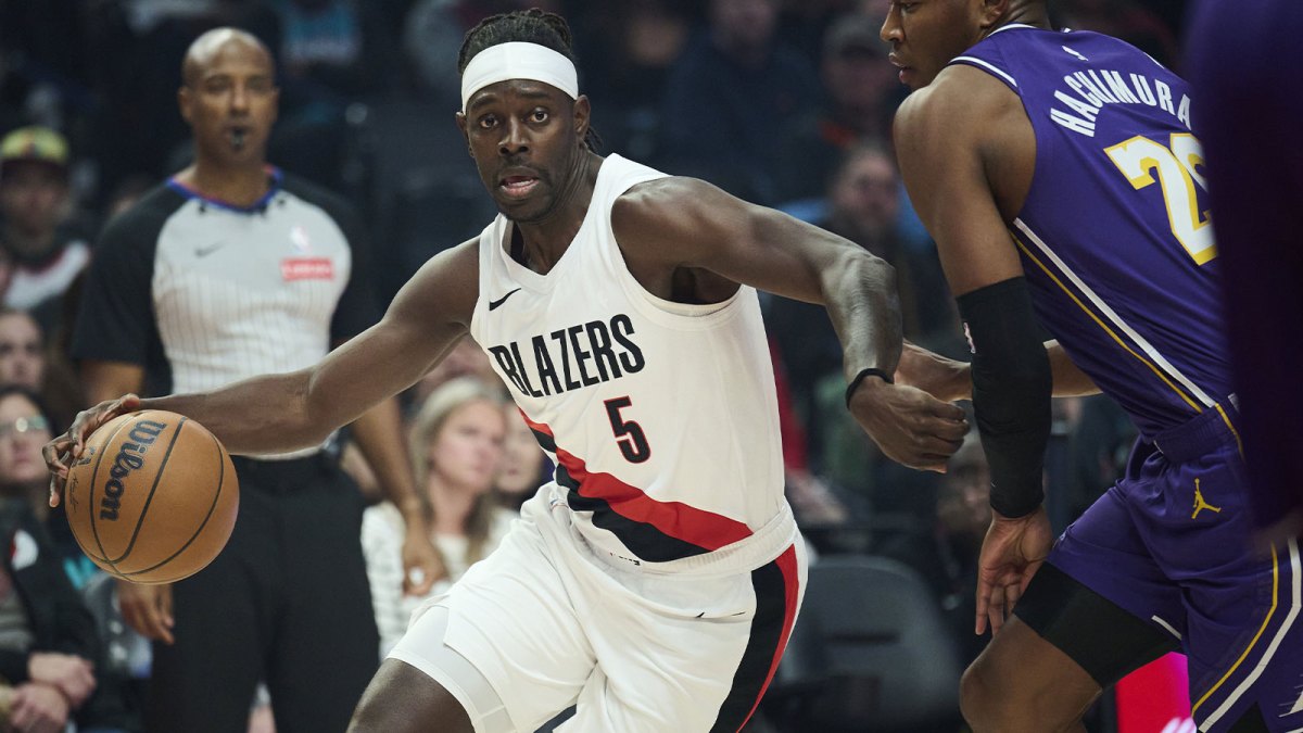 Portland Trail Blazers guard Jrue Holiday (5) drives to the basket during the first half against Los Angeles Lakers forward Rui Hachimura (28) at Moda Center.