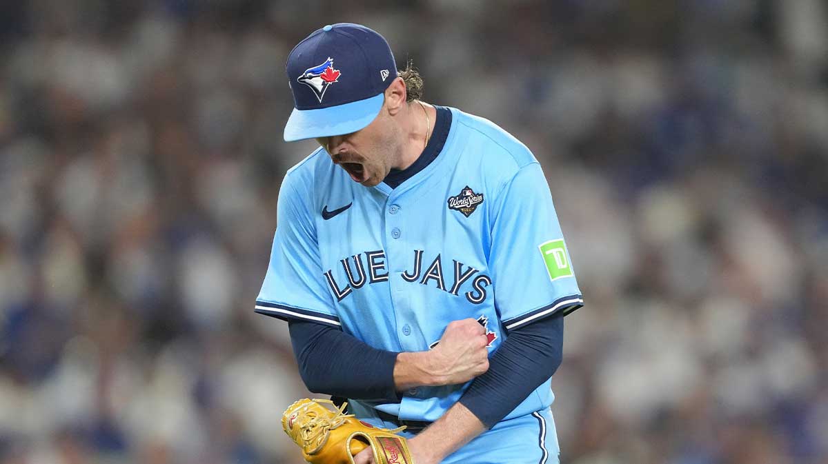Blue Jays pitcher Shane Bieber (57) reacts in the fifth inning against the Dodgers.