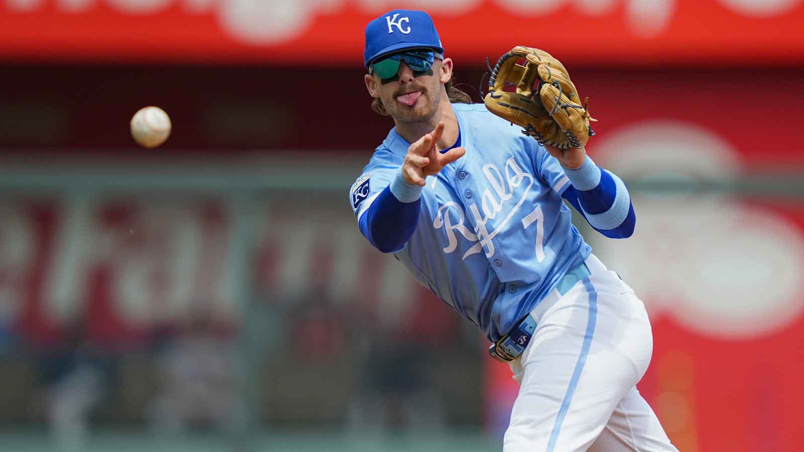 Kansas City Royals shortstop Bobby Witt Jr. (7) throws to first base during the first inning against the Atlanta Braves at Kauffman Stadium.