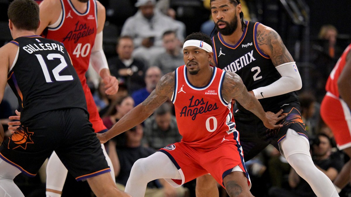 Los Angeles Clippers guard Bradley Beal (0) defends Phoenix Suns guard Collin Gillespie (12) during the first half at Intuit Dome.