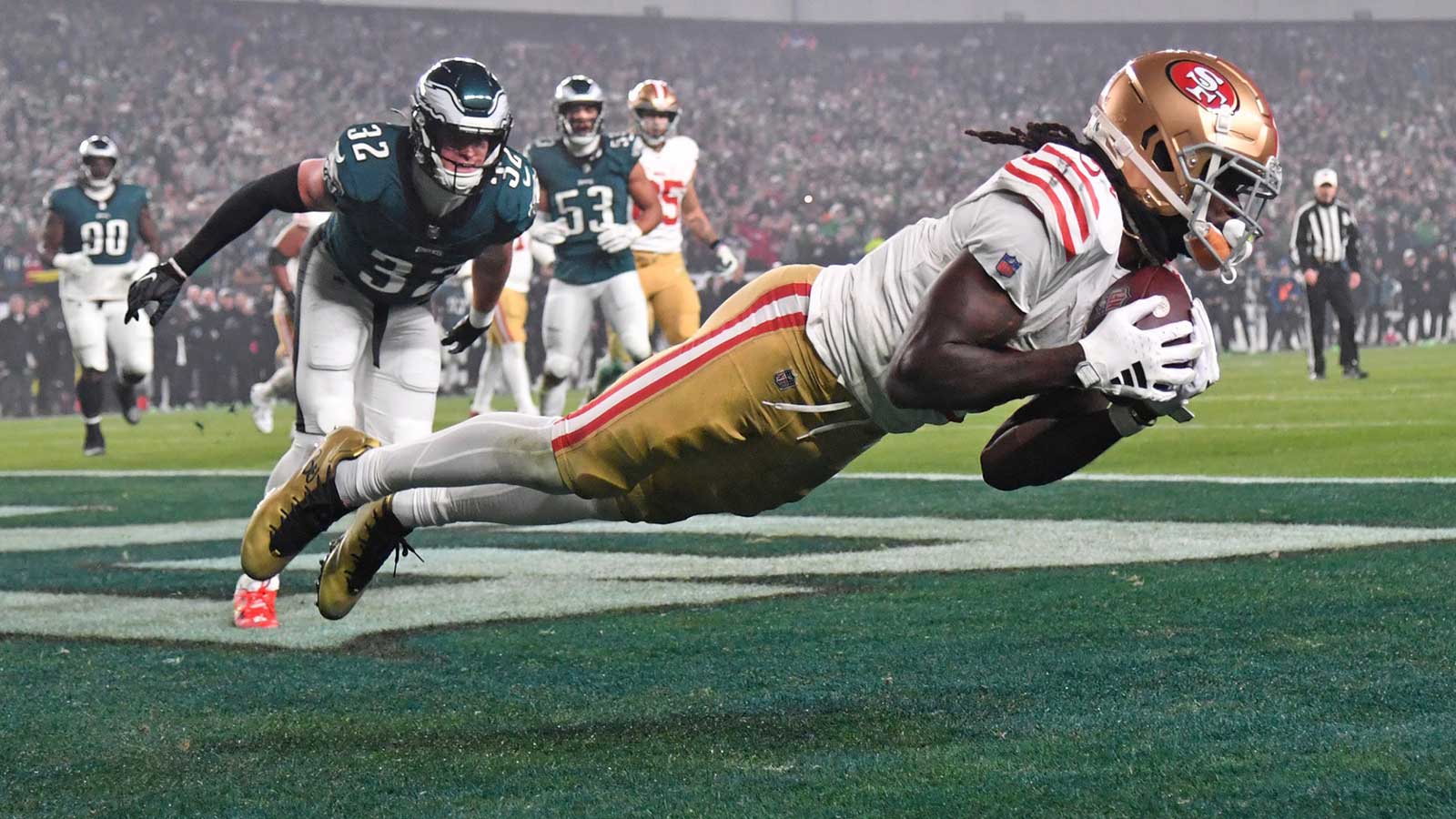 San Francisco 49ers wide receiver Brandon Aiyuk (11) catches touchdown pass against Philadelphia Eagles safety Reed Blankenship (32) during the second quarter at Lincoln Financial Field. 