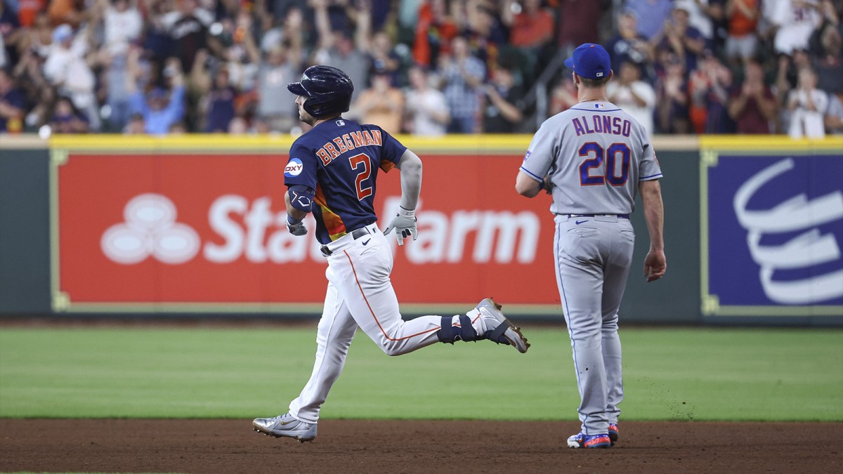 New York Mets first baseman Pete Alonso (20) looks on as Houston Astros third baseman Alex Bregman (2) rounds the bases after hitting a home run during the third inning at Minute Maid Park.