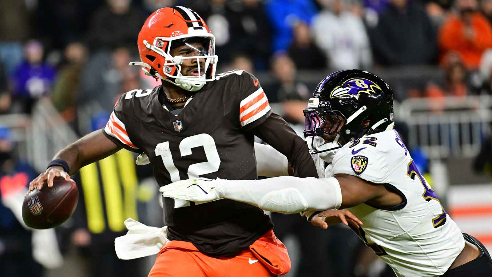 Cleveland Browns quarterback Shedeur Sanders (12) is sacked by Baltimore Ravens linebacker Trenton Simpson (32) during the fourth quarter at Huntington Bank Field.