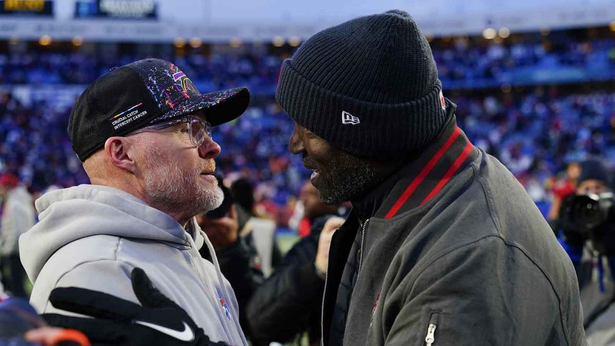 Buffalo Bills head coach Sean McDermott and Tampa Bay Buccaneers head coach Todd Bowles hug after the game at Highmark Stadium