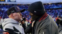 Buffalo Bills head coach Sean McDermott and Tampa Bay Buccaneers head coach Todd Bowles hug after the game at Highmark Stadium