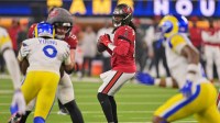 Tampa Bay Buccaneers quarterback Teddy Bridgewater (10) looks to pass the ball against the Los Angeles Rams during the third quarter at SoFi Stadium.