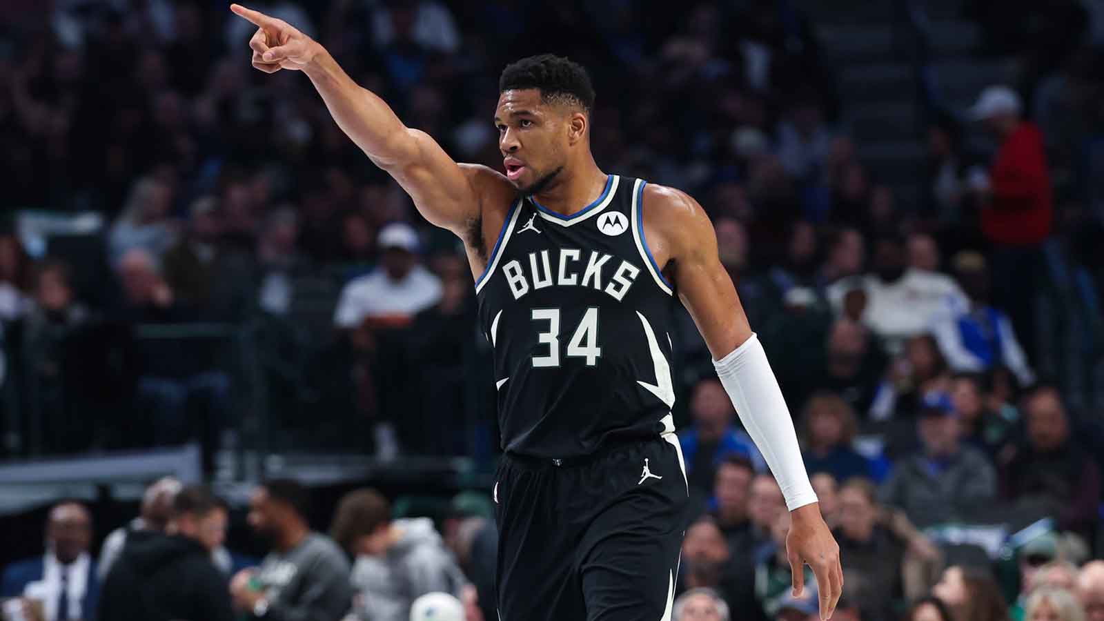  Milwaukee Bucks forward Giannis Antetokounmpo (34) reacts against the Dallas Mavericks during the first quarter at American Airlines Center.