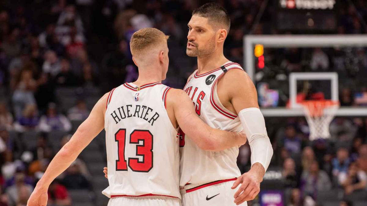Chicago Bulls guard Kevin Huerter (13) and center Nikola Vucevic (9) celebrate after defeating the Sacramento Kings at Golden 1 Center.