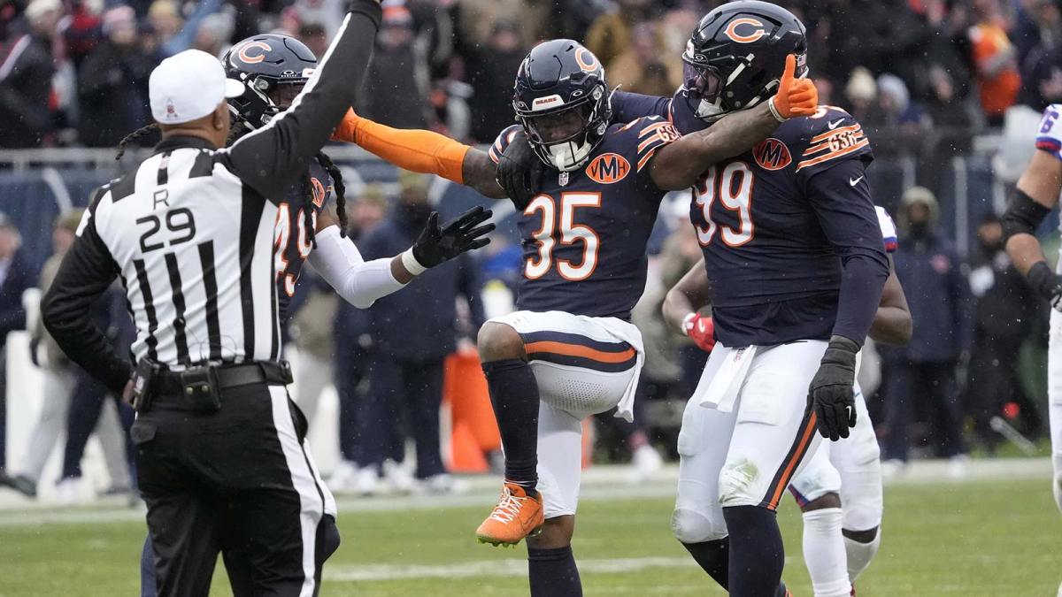 Chicago Bears safety C.J. Gardner-Johnson (35) celebrates with defensive tackle Gervon Dexter Sr. (99) after a sack during the second half against the New York Giants at Soldier Field.