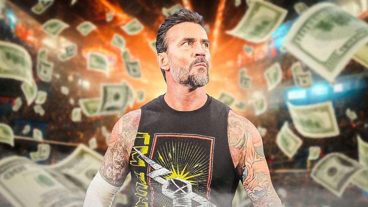 WWE star CM Punk with money all around him.