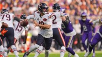 Chicago Bears quarterback Caleb Williams (18) runs in the pocket during the first quarter against the Minnesota Vikings at U.S. Bank Stadium.