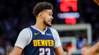 Denver Nuggets forward Cameron Johnson (23) makes a face against the Golden State Warriors during the fourth quarter at Chase Center.