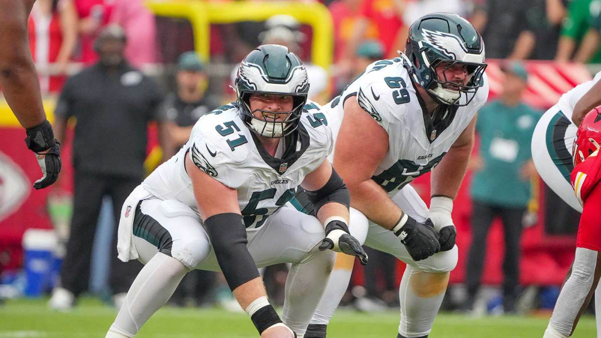Philadelphia Eagles center Cam Jurgens (51) and guard Landon Dickerson (69) at the line of scrimmage against the Kansas City Chiefs during the second half of the game at GEHA Field at Arrowhead Stadium.