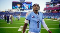 Tennessee Titans quarterback Cam Ward (1) exits the field after the game against the Seattle Seahawks at Nissan Stadium.