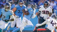 Tennessee Titans quarterback Cam Ward (1) runs the ball against the Houston Texans during the fourth quarter at Nissan Stadium in Nashville, Tenn., Sunday, Nov. 16, 2025.