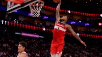 Washington Wizards forward Cam Whitmore (1) dunks against against the Houston Rockets during the third quarter at Toyota Center.